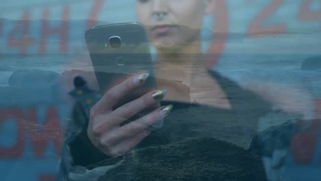 Animation-of-caucasian-woman-using-smartphone-over-seascape