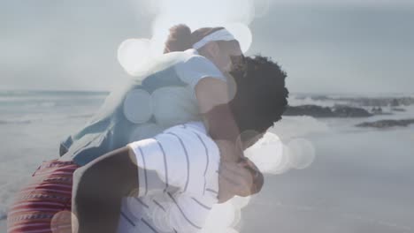 Animation-Eines-Glücklichen-Afroamerikanischen-Paares,-Das-Sich-Am-Strand-über-Dem-Meer-Vergnügt