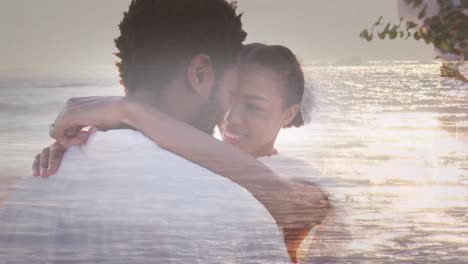 Animation-Des-Meeres-über-Einem-Verheirateten-Afroamerikanischen-Paar-Am-Strand