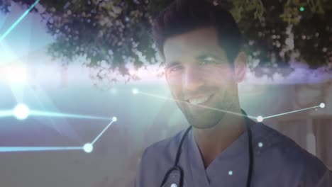 Animation-of-interconnecting-dots-with-lines-over-portrait-of-smiling-male-caucasian-doctor