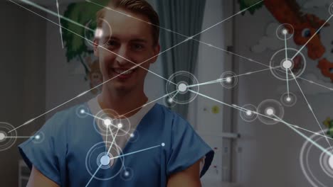 Animation-of-dots-interconnecting-with-lines-over-portrait-of-smiling-male-caucasian-doctor