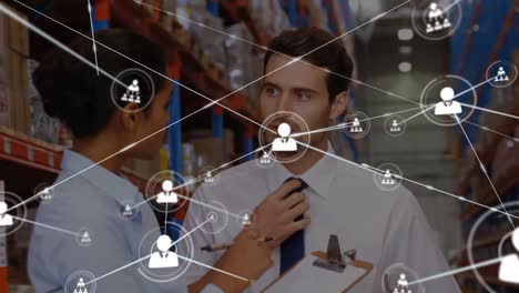 Animation-of-profile-icons-connecting-dots,-caucasian-colleagues-discussing-at-warehouse