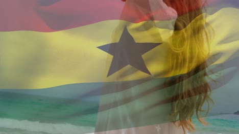 Animación-De-La-Bandera-De-Ghana-Sobre-Una-Mujer-Caucásica-En-La-Playa.