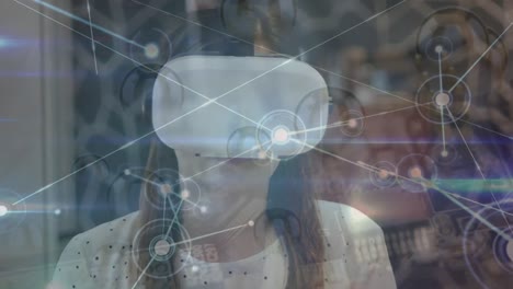 Animation-of-network-of-connections-with-icons-and-light-spots-over-caucasian-woman-using-vr-headset