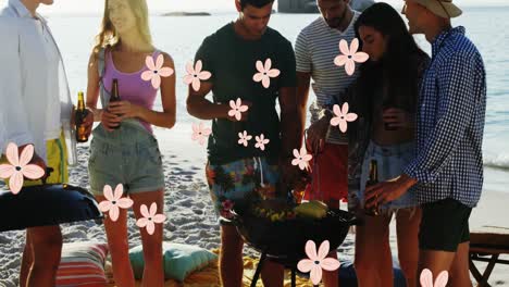Animation-of-flowers-over-happy-diverse-friends-having-party-on-beach