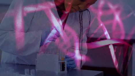 Animation-of-dna-strands-over-african-american-female-scientist-in-lab
