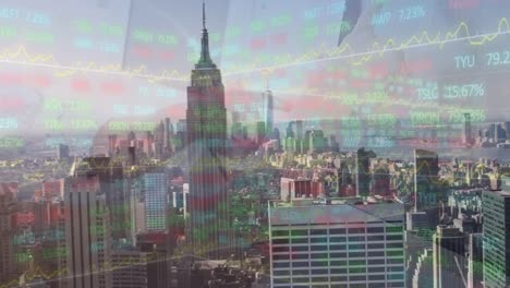Animation-of-trading-board-and-coworkers-discussing-over-computer-over-empire-state-building-in-city