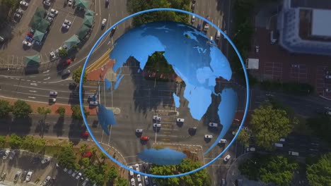 Animation-Eines-Globus,-Der-Sich-über-Einer-Luftaufnahme-Des-Verkehrs-Auf-Der-Straße-Dreht