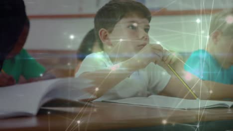 Animation-of-network-of-connections-over-caucasian-boy-in-classroom
