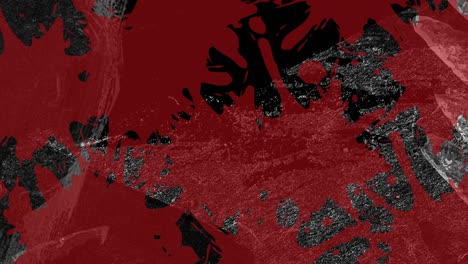 Animation-of-red-paint-splats-over-moving-grey-organic-textures-on-black-background