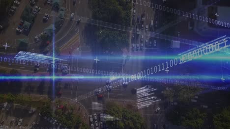Animation-of-data-processing-and-lights-over-cityscape-and-road-traffic