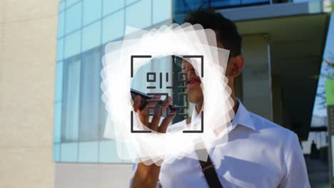 Animation-of-shapes-and-qr-code-over-biracial-man-using-smartphone