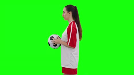 Vídeo-De-Una-Jugadora-De-Fútbol-Caucásica-Sosteniendo-Fútbol-Y-Copiando-Espacio-En-Pantalla-Verde