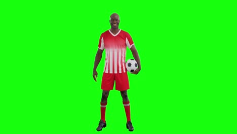 Video-of-happy-african-american-male-soccer-player-with-ball-on-green-screen-background