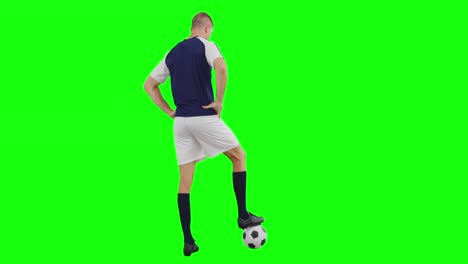 Video-of-caucasian-male-soccer-player-with-ball-on-green-screen-background