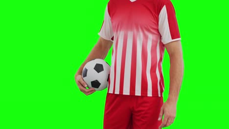 Video-of-caucasian-male-soccer-player-with-ball-on-green-screen-background