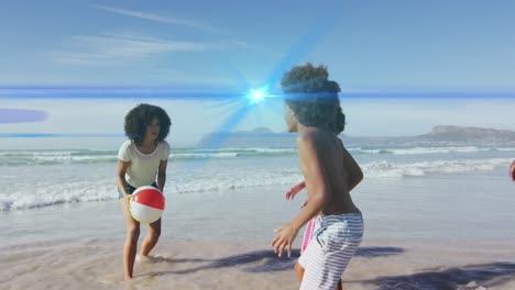 Animation-of-light-spots-over-african-american-family-at-beach