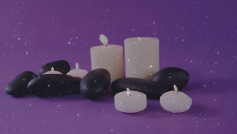 Animation-Von-Lichtpunkten-über-Kerzen-Und-Steinen