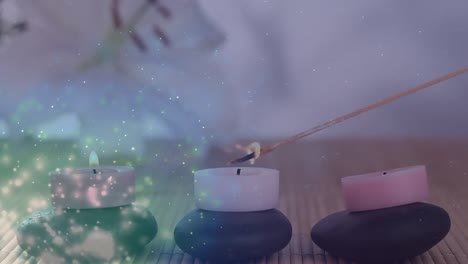 Animation-Von-Lichtpunkten-über-Kerzen-Und-Blumen