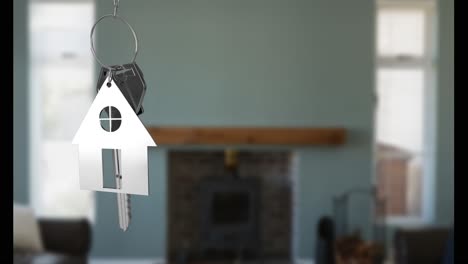 Animation-of-silver-key-and-house-over-house-interior