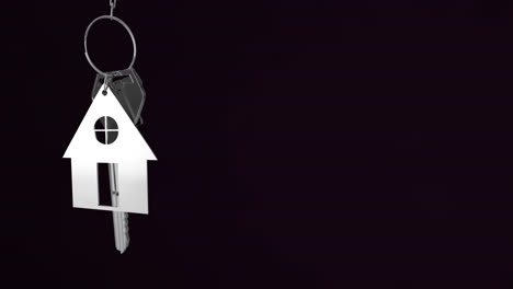 Animation-of-silver-house-keys-hanging-against-black-background-with-copy-space