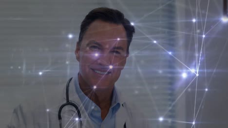 Animation-of-network-of-connections-with-light-spots-over-caucasian-male-doctor