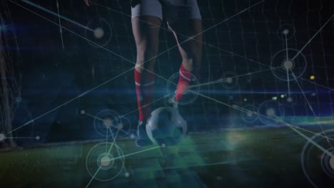 Animation-Des-Netzwerks-Von-Verbindungen-über-Dem-Unteren-Teil-Eines-Männlichen-Fußballspielers,-Der-Fußball-Spielt