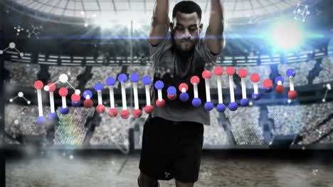 Animation-of-african-american-male-rugby-player-and-dna-strand-over-sports-stadium