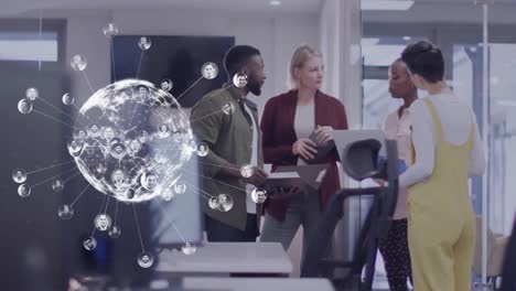Animation-of-globe-with-icons-over-diverse-business-people-in-office