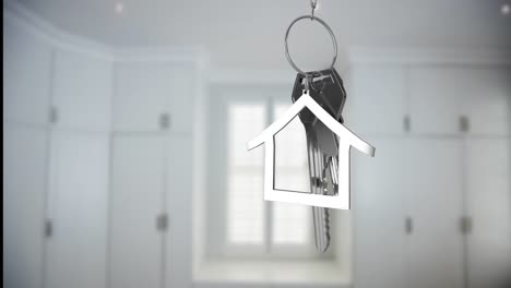 Animation-of-keys-with-house-moving-over-room-interior