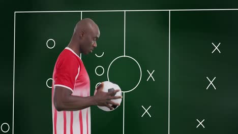 Animation-of-stadium-plan-over-african-american-male-soccer-player