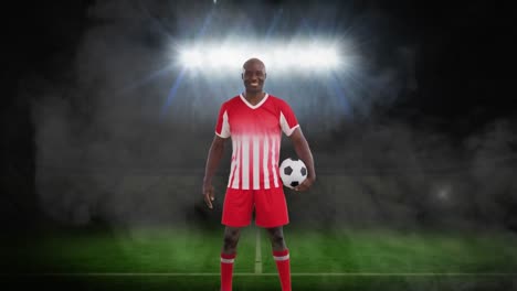 Animation-of-stadium-and-smoke-over-african-american-male-soccer-player