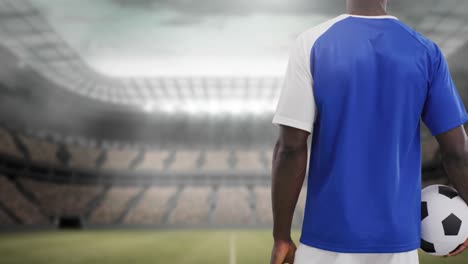Animation-of-stadium-over-african-american-male-soccer-player
