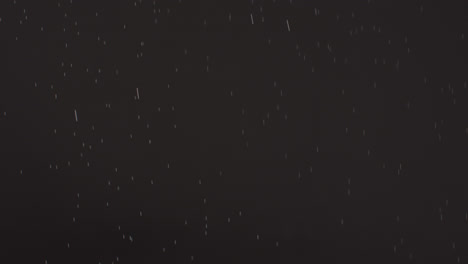 Video-Von-Fallendem-Leuchtend-Weißem-Schnee-über-Dem-Hintergrund-Des-Nachthimmels