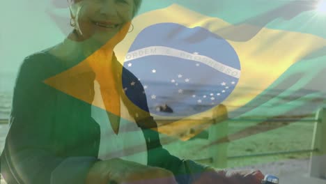 Animation-of-flag-of-brazil-over-senior-caucasian-woman