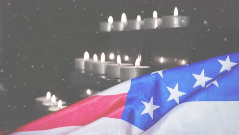 Animation-of-snow-falling-over-candles-and-flag-of-usa