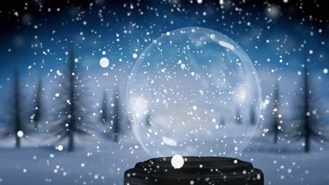 Animation-of-snow-falling-over-snow-ball-and-winter-landscape