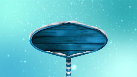 Animation-of-snow-falling-over-wooden-board-with-copy-space-on-light-blue-background