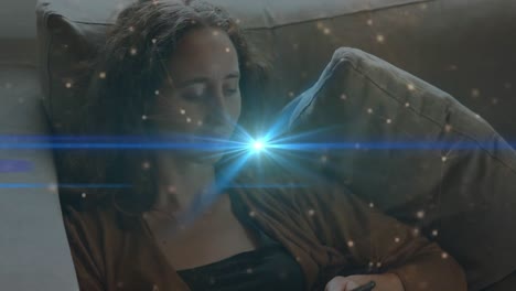 Animation-of-network-of-connections-and-light-trails-over-biracial-woman-using-smartphone