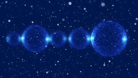 Animation-of-bubbles-and-snow-moving-on-blue-background