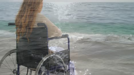 Animation-of-sea-landscape-over-disabled-cuacasian-woman-sitting-in-wheelchair