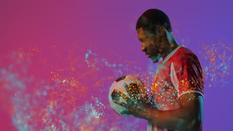 Animation-Eines-Afroamerikanischen-Männlichen-Fußballspielers-über-Flecken