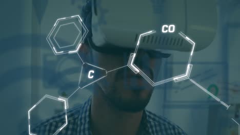 Animation-of-chemical-equations-over-caucasian-man-using-vr-headset