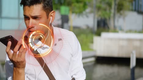 Animation-of-spinning-round-scanner-over-biracial-man-talking-on-smartphone-outdoors