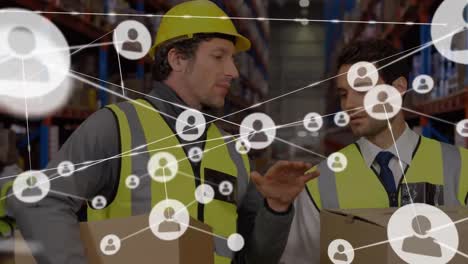 Animation-of-network-of-profiles-over-caucasian-male-supervisor-and-worker-discussing-at-warehouse
