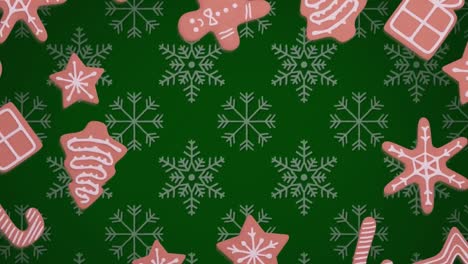 Animation-of-christmas-gingerbread-cookies-over-snowflakes-pattern-on-green-background