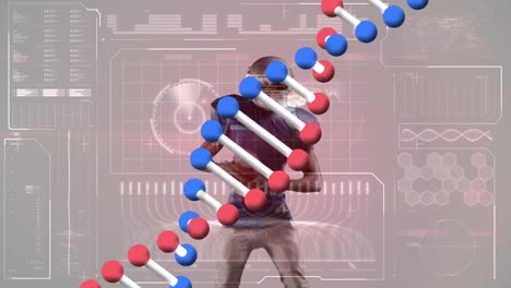 Animation-of-african-american-male-rugby-player-and-dna-strand-over-data-processing