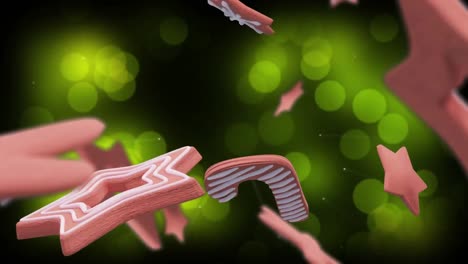 Animation-Von-Weihnachtslebkuchenplätzchen-über-Grünen-Lichtern-Im-Hintergrund