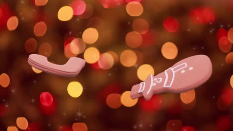 Animation-Von-Weihnachtslebkuchenplätzchen-über-Weihnachtsbaumlichtern