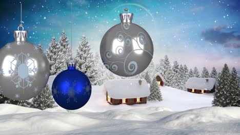 Animation-of-baubles-and-snow-falling-over-winter-landscape